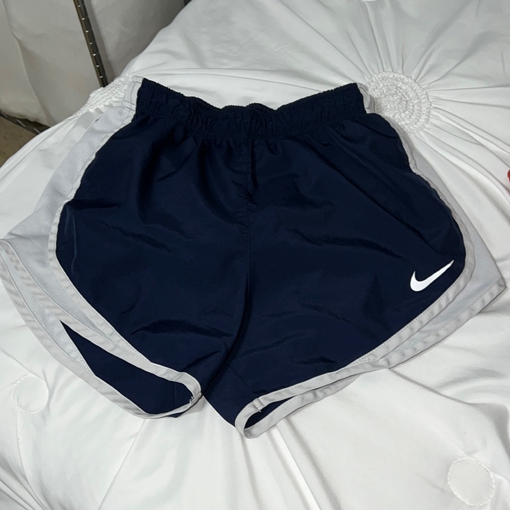 navy and white nike shorts